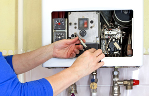 Women worried because he has broken the boiler.